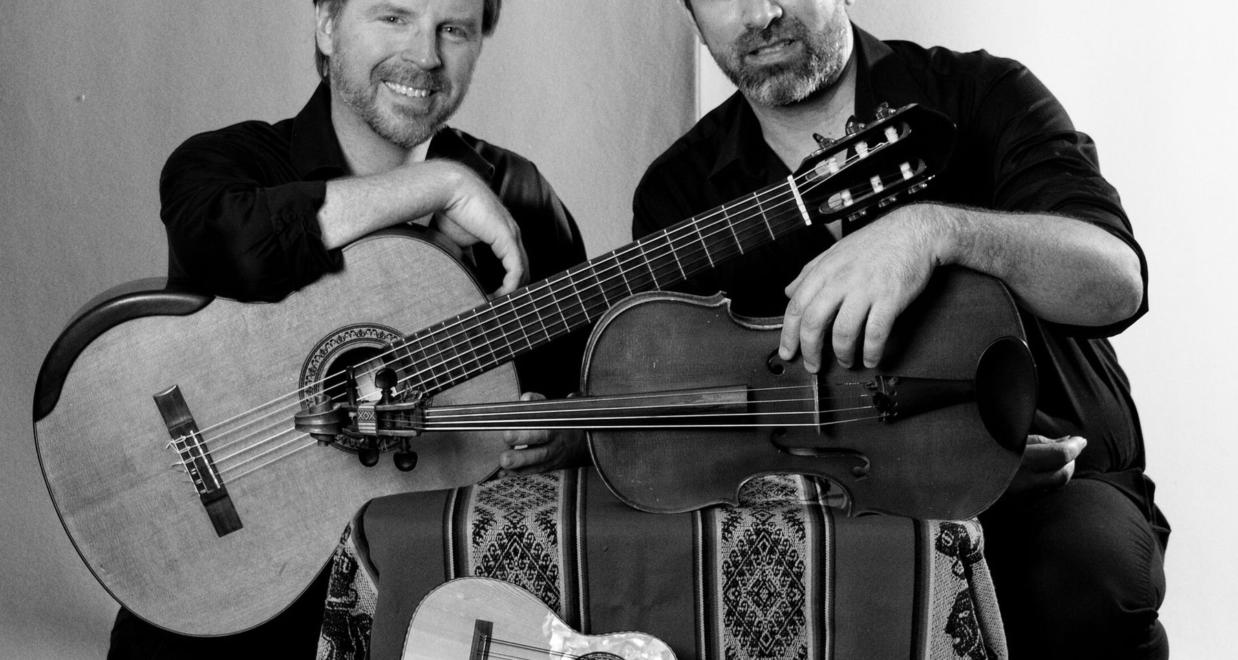From the Extremes: New Music from the North And South for charango, viola, and guitar performed by Alturas Duo; Carlos Boltes, viola and charango, Scott Hill, guitar.